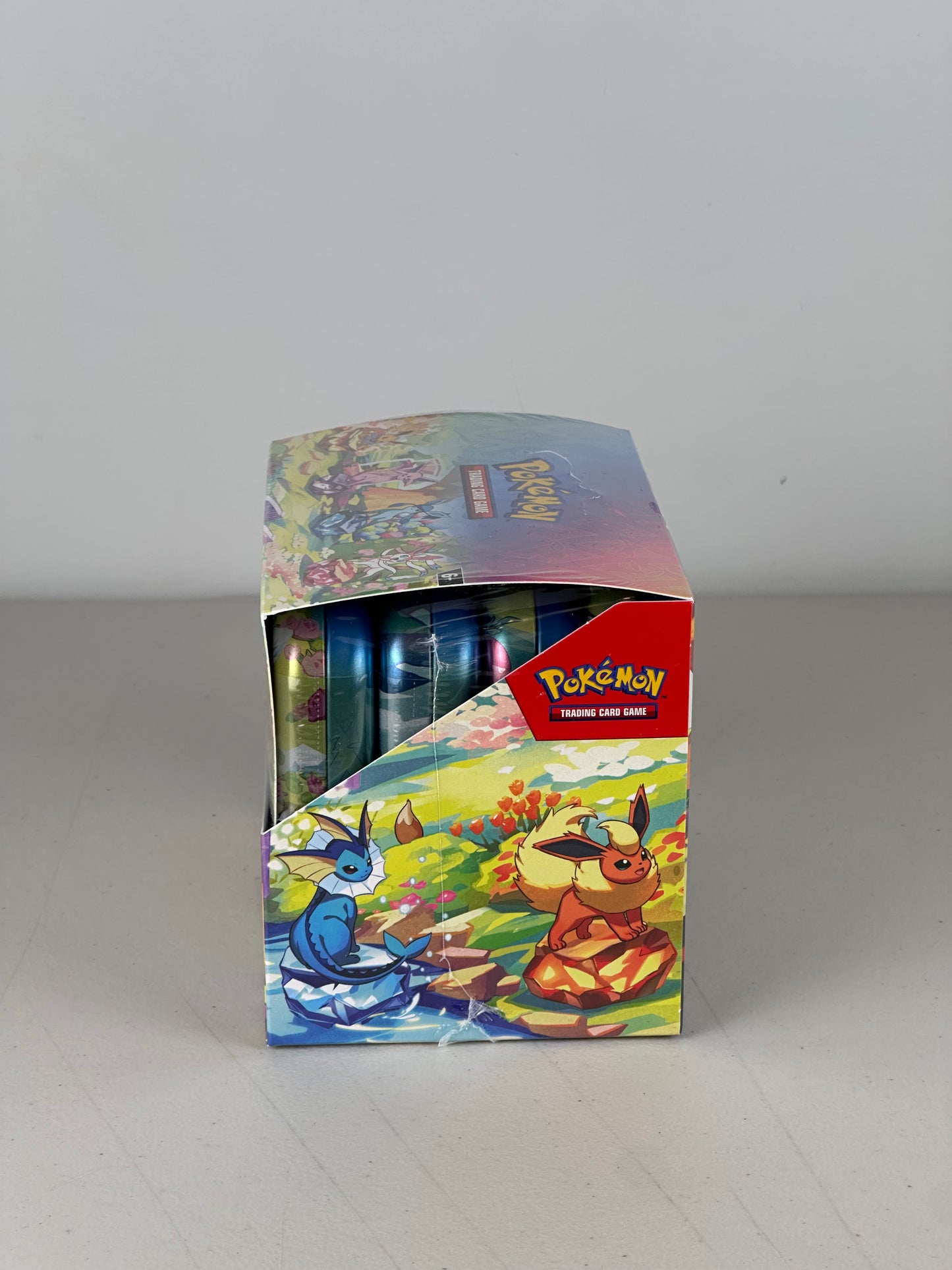 Pokémon Scarlet & Violet Prismatic Evolutions 8 Tin Mini Display